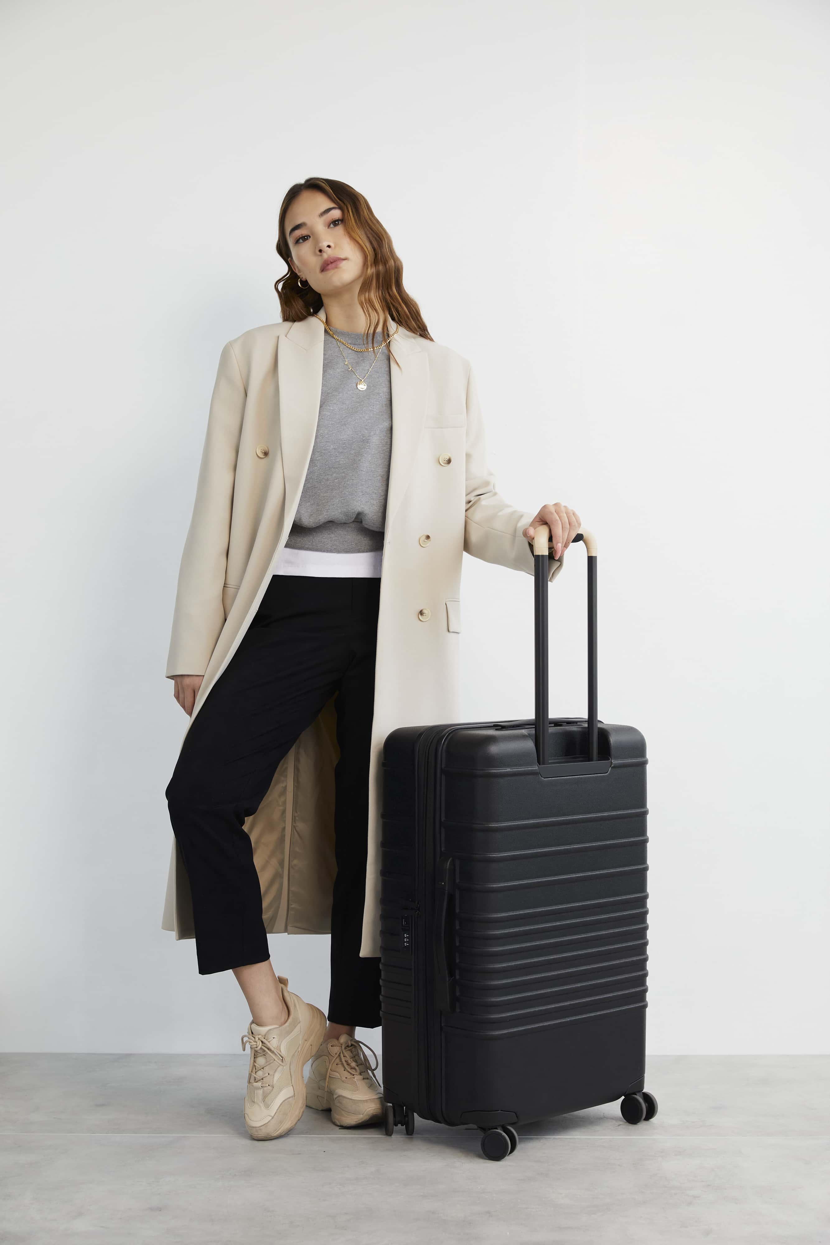 The Medium Check-In Roller in Black - Image 9